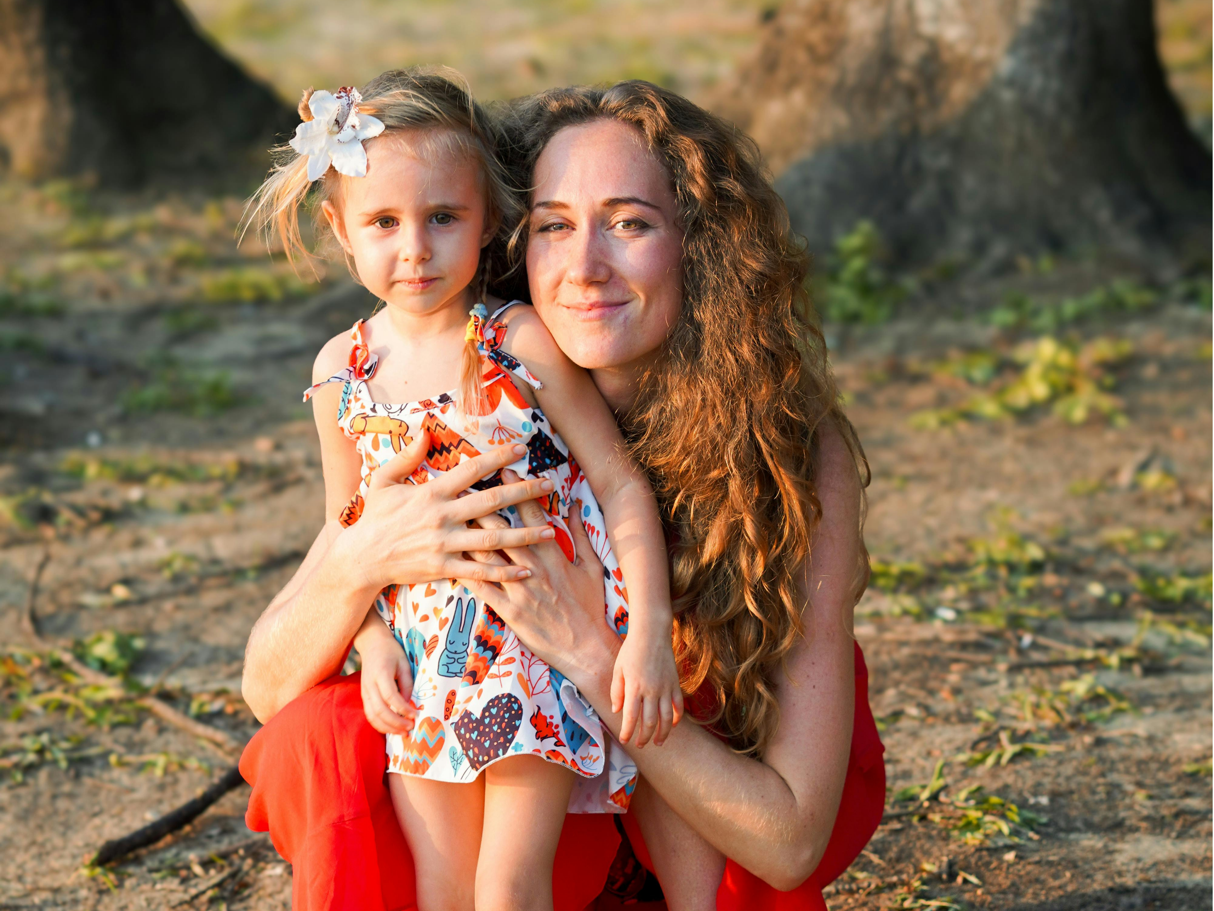 Mother smiling with her and child.